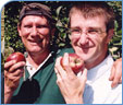 Men eating apples